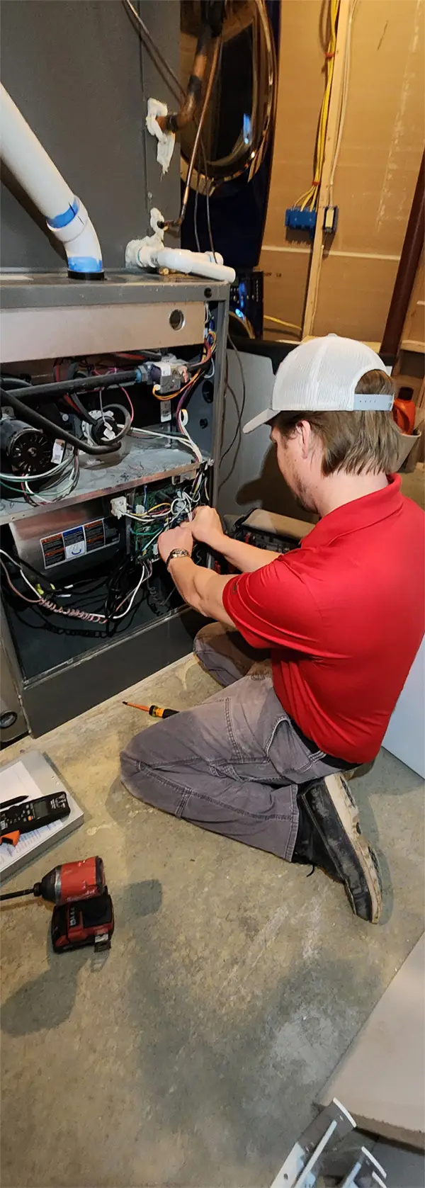 Bison Home Service technician fixing Furnace Issues
